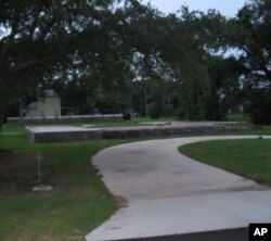 This slab foundation, remaining from a house destroyed by Katrina, is one of many still found along the coast.