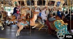 The Glen Echo "menagerie" carousel is made up of 40 horses, 4 rabbits, 4 ostriches, a giraffe, a deer, a lion, and a tiger, which stand in three concentric rings.