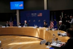 U.S. President Joe Biden, center, speaks during the EU-US summit at the European Council building in Brussels, Tuesday, June 15, 2021. (AP Photo/Francisco Seco)