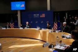 U.S. President Joe Biden, center, speaks during the EU-US summit at the European Council building in Brussels, Tuesday, June 15, 2021. (AP Photo/Francisco Seco)