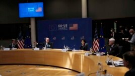 U.S. President Joe Biden, center, speaks during the EU-US summit at the European Council building in Brussels, Tuesday, June 15, 2021. (AP Photo/Francisco Seco)
