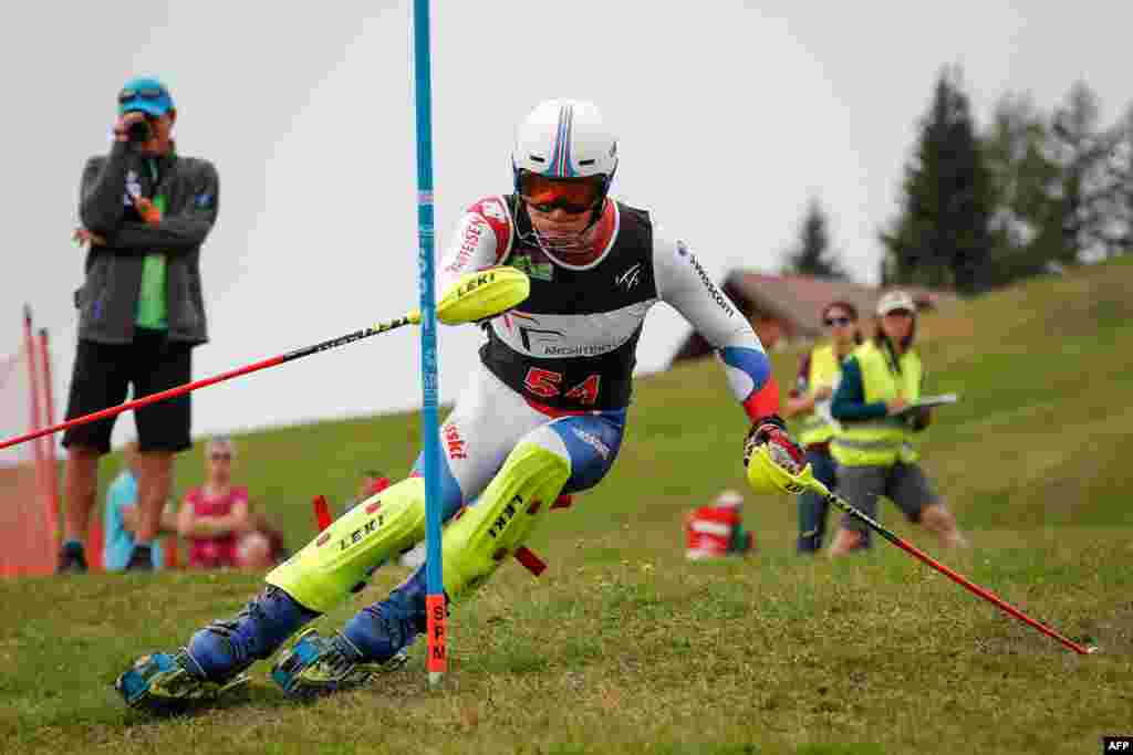 Vito Schnabel competes during the first run of the slalom event at the FIS Grasski World Championships in Marbachegg, Switzerland, Aug. 17, 2019.