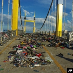 Piles of shoes and clothes were left on Diamond Bridge one day after the Water Festival stampede.