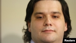 FILE - Mark Karpeles, chief executive of Mt. Gox, attends a news conference at the Tokyo District Court in Tokyo, February 28, 2014.