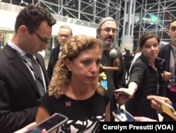 FILE - Debbie Wasserman Schultz, former Democratic National Committee chairwoman, is interviewed at the Jacob Javits Convention Center, where the Hillary Clinton campaign is holding a party, in New York, Nov. 8, 2016.
