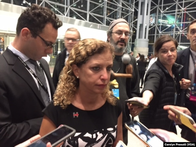 FILE - Debbie Wasserman Schultz, former Democratic National Committee chairwoman, is interviewed at the Jacob Javits Convention Center, where the Hillary Clinton campaign is holding a party, in New York, Nov. 8, 2016.