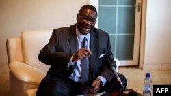 Malawian presidential candidate Peter Mutharika, brother of the late president Bingu wa Mutharika, gestures during a press conference at his residence in Blantyre, Malawi, May 22, 2014.
