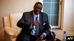 Malawian presidential candidate Peter Mutharika, brother of the late president Bingu wa Mutharika, gestures during a press conference at his residence in Blantyre, Malawi, May 22, 2014.