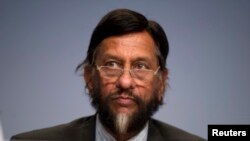 FILE - IPCC Working Group III Chairman Rajendra Pachauri attends a news conference.