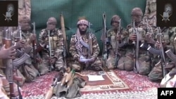 FILE - Man claiming to be leader of Nigerian Islamist extremist group Boko Haram, Abubakar Shekau, in video screengrab, unknown location, Sept. 25, 2013.