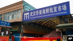 FILE - The Huanan Seafood Wholesale Market sits closed in Wuhan in central China's Hubei province, Jan. 21, 2020.