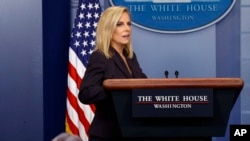 Secretary of Homeland Security Kirstjen Nielsen arrives for the daily press briefing at the White House, April 4, 2018, in Washington. 
