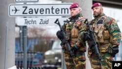 Belgian Army soldiers patrol at Zaventem Airport in Brussels on Wednesday, March 23, 2016.