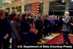 U.S. Secretary of State John Kerry addresses family members and staff at the U.S. Embassy in Kabul, Afghanistan, April 9, 2016.