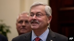 FILE - Iowa Governor Terry Branstad, President Donald Trump's pick for ambassador to China, attends an event in the Roosevelt Room at the White House in Washington, April 26, 2017. 
