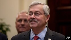 FILE - Iowa Governor Terry Branstad, President Donald Trump's pick for ambassador to China, attends an event in the Roosevelt Room at the White House in Washington, April 26, 2017. 