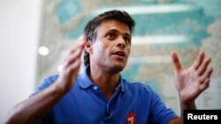 FILE - Venezuelan opposition leader Leopoldo Lopez speaks during an interview in Caracas, Feb. 11, 2014. 