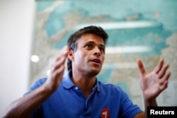 FILE - Venezuelan opposition leader Leopoldo Lopez speaks during an interview in Caracas, Feb. 11, 2014.