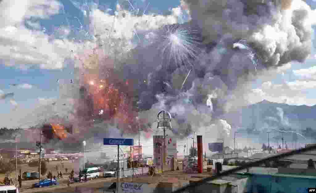 A massive explosion guts Mexico&#39;s biggest fireworks market in Tultepec, Dec. 20, 2016. The explosion killed at least 31 people and injured 72, authorities said. The conflagration in the Mexico City suburb of Tultepec set off a quick-fire series of multi-colored blasts that sent a vast cloud of smoke billowing over the capital.