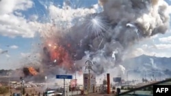 Foto gwo eksplozyon ki fèt nan pi wo mache fedatifis peyi Meksik la nan vil Tultepec, nan dat 20 desanm 2016 la.
