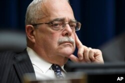 FILE - In a April 10, 2014, photo, Rep. Gerald Connolly. listens during a hearing on Capitol Hill in Washington.