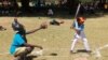 Kelly Lemaiyen, captain of the Kilimanjaro All-Stars, is one of the shortest members on the team, and one of the youngest at just 12, but he commands respect on the baseball diamond. (L. Ruvaga/VOA) 