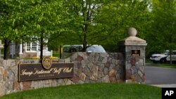 FILE - The entrance to Trump National Golf Club in Bedminster, N.J., is pictured May 7, 2017.