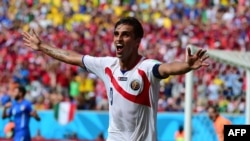 Costa Rica's forward Bryan Ruiz celebrates after scoring his team's first goal during a Group D match between Italy and Costa Rica at the Pernambuco Arena in Recife during the 2014 FIFA World Cup in Brazil, June 20, 2014.