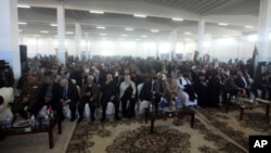 People attend a founding conference of the council of the Cyrenaica province in Benghazi, March 6, 2012. 