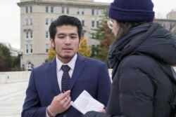 Jirayuth Latthivongsakorn, a DACA recipient, and a reporter after the Supreme Court's DACA hearing