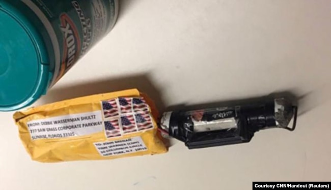 A package containing a "live explosive device" according to police, received at the Time Warner Center which houses the CNN New York bureau, in New York City, is shown in this handout picture provided Oct.24, 2018.