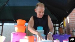 Tupperware, it seems, is enjoying a renaissance 65 years after it first hit the market with Wonder Bowls, Bell Tumblers and Ice-Tup molds for homemade frozen treats. (AP Photo/Garrett Cheen)