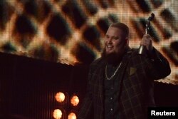 Rory Graham, lead singer of British band Rag 'n' Bone, accepts the award for British breakthrough at the Brit Awards at the O2 Arena in London, Feb. 22, 2017.