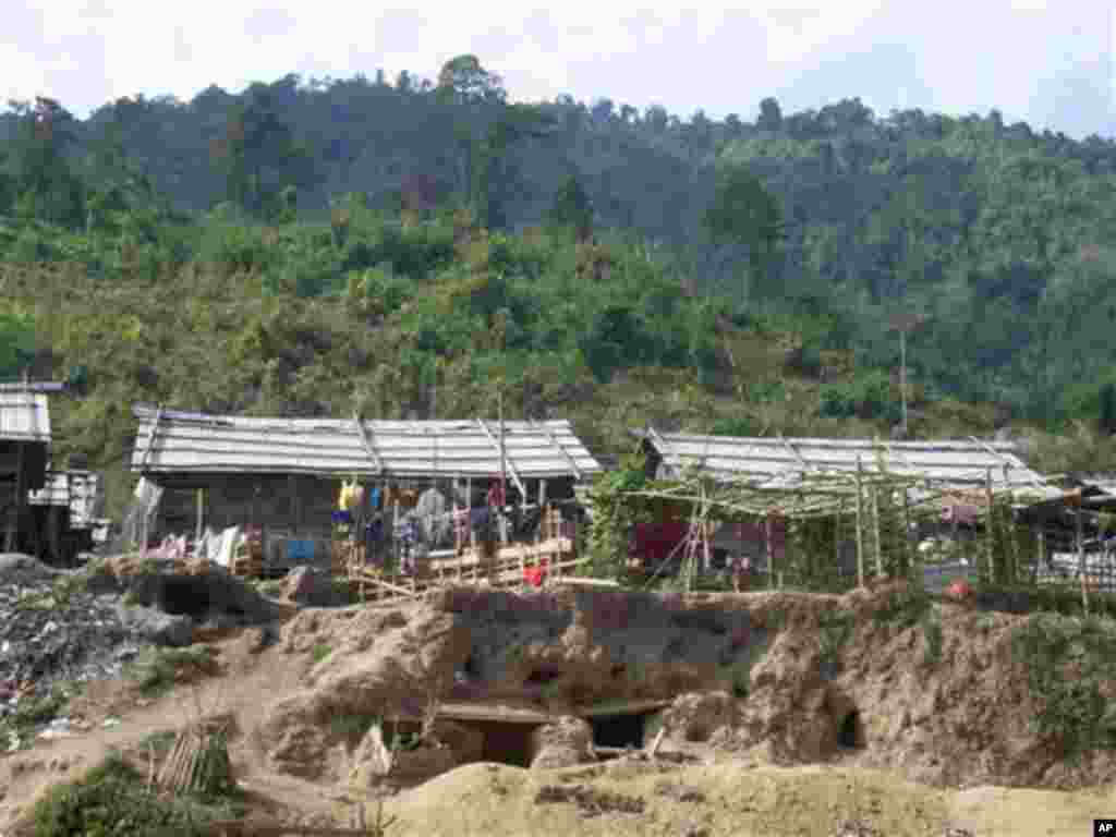 Bomb shelters built by Kachin refugees, at the Je Yang IDP camp, near Laiza, northeastern Myanmar, Friday, Jan. 4, 2013. Je Yang is the biggest and closest camp to Laiza where KIA headquarter is located. There are over 7,000 refugees at the camp accordin
