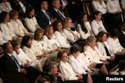 Democratic women of the U.S. House of Representatives listen to President Donald Trump's second State of the Union address to a joint session of the U.S. Congress in the House Chamber of the U.S. Capitol in Washington, Feb. 5, 2019.