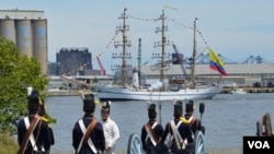 To kick off the 200th anniversary of the War of 1812, ships from around the world sailed past Fort McHenry and exchanged cannon fire with re-enactors on land, but it was all for show. (S. Logue/VOA)