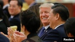 U.S. President Donald Trump and China's President Xi Jinping attend a state dinner at the Great Hall of the People in Beijing, China, Nov. 9, 2017. 