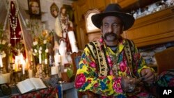 Zoltan Sztojka, traditional Gypsy fortune-teller is seen in his home in Soltvadkert, central Hungary on Oct. 10, 2021. Sztojka, by his own account Hungary's last Roma fortuneteller, is working to preserve his culture's traditions that are slowly vanishing