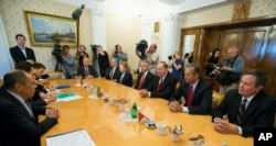 Russian Foreign Minister Sergey Lavrov, left, listens to U.S. Sen. Richard Shelby, third from right, during his meeting with a U.S. congressional delegation, as U.S. Ambassador to Russia Jon Huntsman Jr. (to Shelby's right) attends looks on, in Moscow, Russia, July 3, 2018.