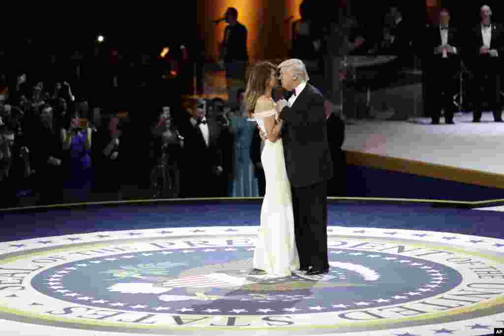 President Donald J. Trump dances with first lady Melania Trump at The Salute To Our Armed Services Inaugural Ball, Jan. 20, 2017, in Washington. 