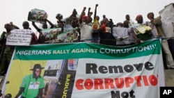People protest following the removal of fuel subsidy by the Government in Lagos ,Nigeria, Jan. 9, 2012. Labor unions began a paralyzing national strike in oil-rich Nigeria, angered by soaring fuel prices and decades of engrained government corruption in 
