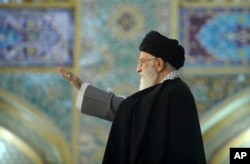 In this picture released by official website of the office of the Iranian supreme leader on March 21, 2017, Supreme Leader Ayatollah Ali Khamenei waves to a crowd in his trip to the northeastern city of Mashhad, Iran.