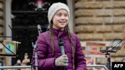 Swedish climate activist Greta Thunberg speaks on stage during a demonstration of students calling for climate protection on March 1, 2019, in front of the city hall in Hambourg, Germany. 