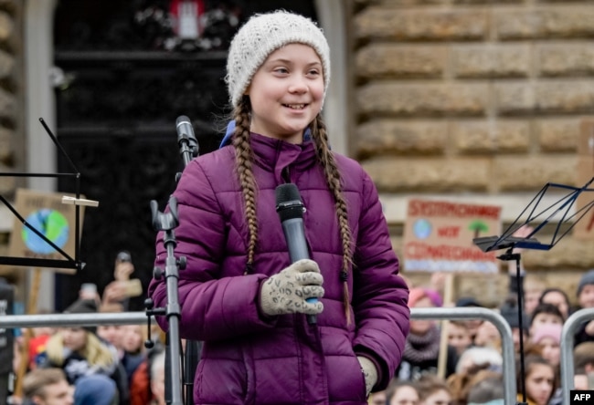 Swedish climate activist Greta Thunberg speaks on stage during a demonstration of students calling for climate protection on March 1, 2019, in front of the city hall in Hamburg, Germany.