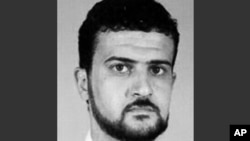 FILE - This file image from the FBI website shows Anas al-Libi, an al-Qaeda leader connected to the 1998 embassy bombings in eastern Africa.