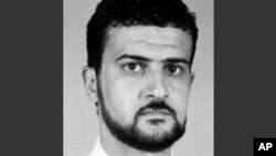 FILE - This file image from the FBI website shows Anas al-Libi, an al-Qaida leader connected to the 1998 embassy bombings in eastern Africa and wanted by the United States for more than a decade.