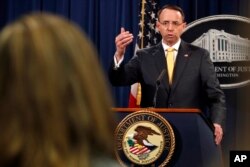 FILE - Deputy Attorney General Rod Rosenstein answers a question after announcing that the office of special counsel Robert Mueller announced a grand jury has charged 13 Russian nationals and several Russian entities, Feb. 16, 2018, in Washington.