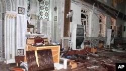 Eman Mosque is seen destroyed after a suicide bomber blew himself upin Damascus, Syria, March 21, 2013 (SANA photo)