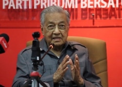 Former Prime Minister Mahathir Mohamad speaks during a press conference at his party headquarters in Petaling Jaya, Malaysia, Friday, May 29, 2020. Mahathir has been ousted from his Malay party in the latest twist to a power struggle