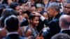 President Barack Obama pats two young girls on the head as he greets guests after speaking at the Congressional Black Caucus Foundation's annual Legislative Conference Phoenix Awards Dinner, Saturday, Sept. 17, 2016, in Washington.